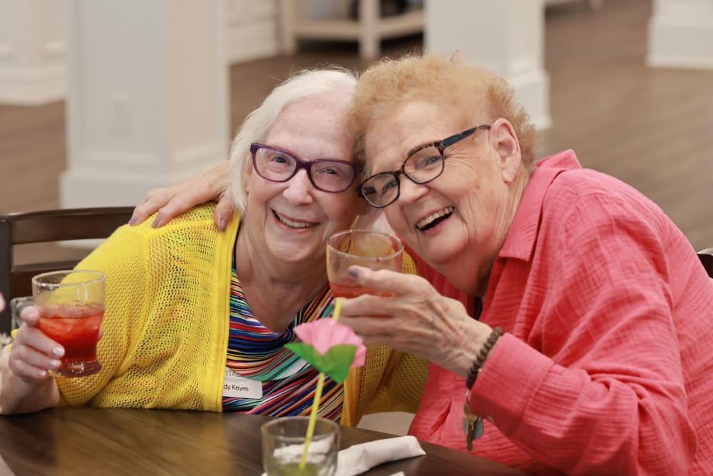 Residents embracing each other at The Westbury Senior Living in Columbia, Missouri