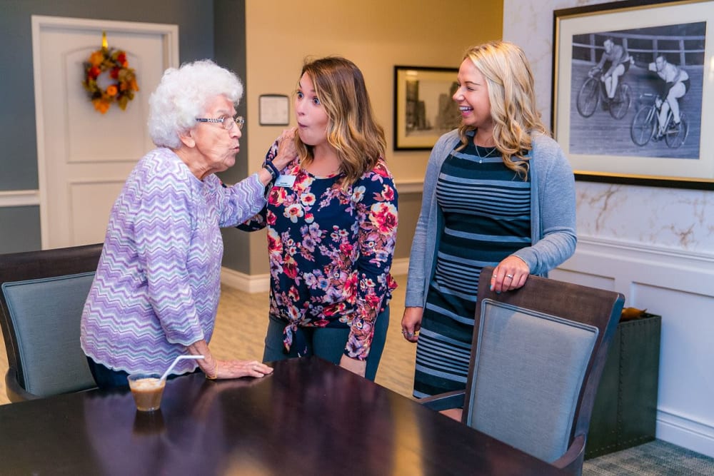 Residents talking to each other at The Westbury Senior Living in Columbia, Missouri