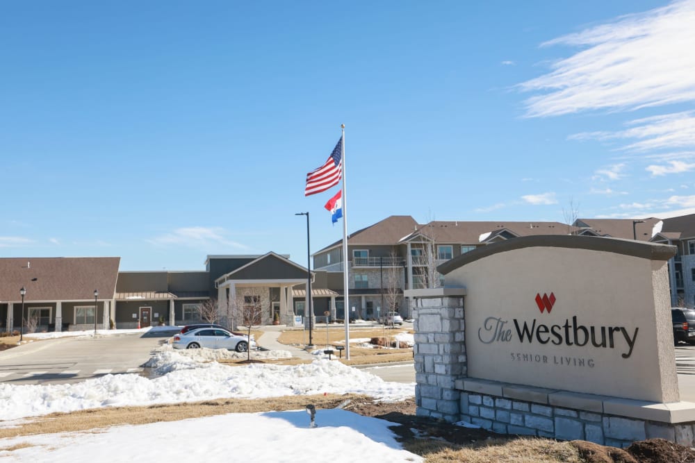 Front entrance with signage at The Westbury Senior Living in Columbia, Missouri