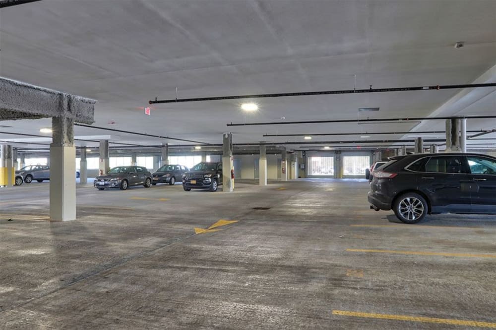 Secure covered parking garage at Pinnacle North Apartments in Canandaigua, New York