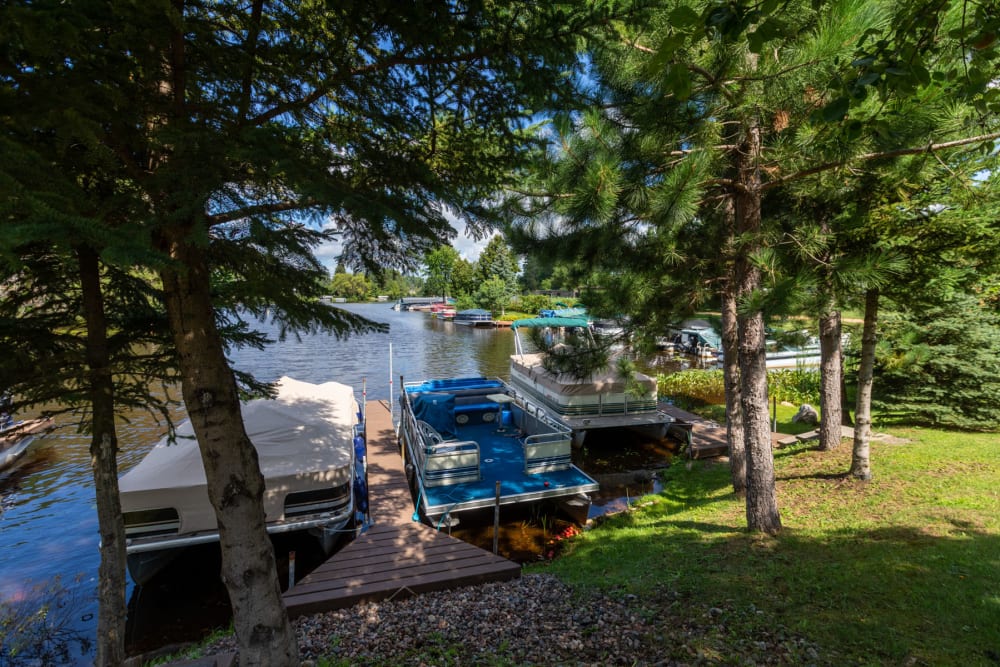 Boats tied off at the dock at Edgewater Homes in Rhinelander, Wisconsin