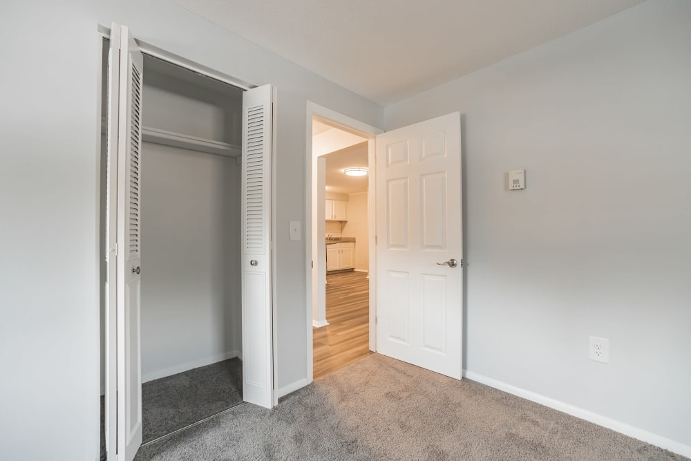 Empty bedroom closet at Eagle Rock Apartments at Nashua in Nashua, New Hampshire