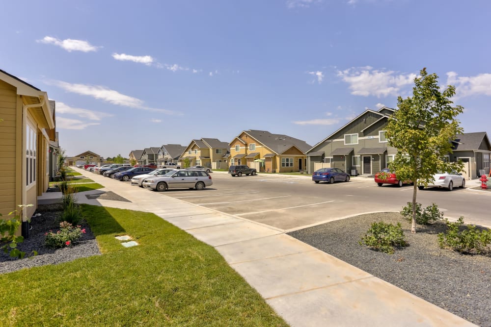 Parking outside townhomes at Cedar Park & Canyon Falls Townhomes in Twin Falls, Idaho