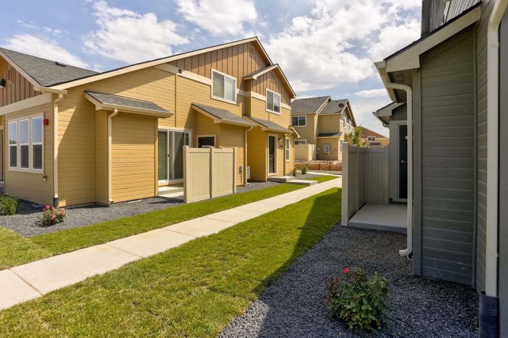 Path outside a townhome at Cedar Park & Canyon Falls Townhomes in Twin Falls, Idaho