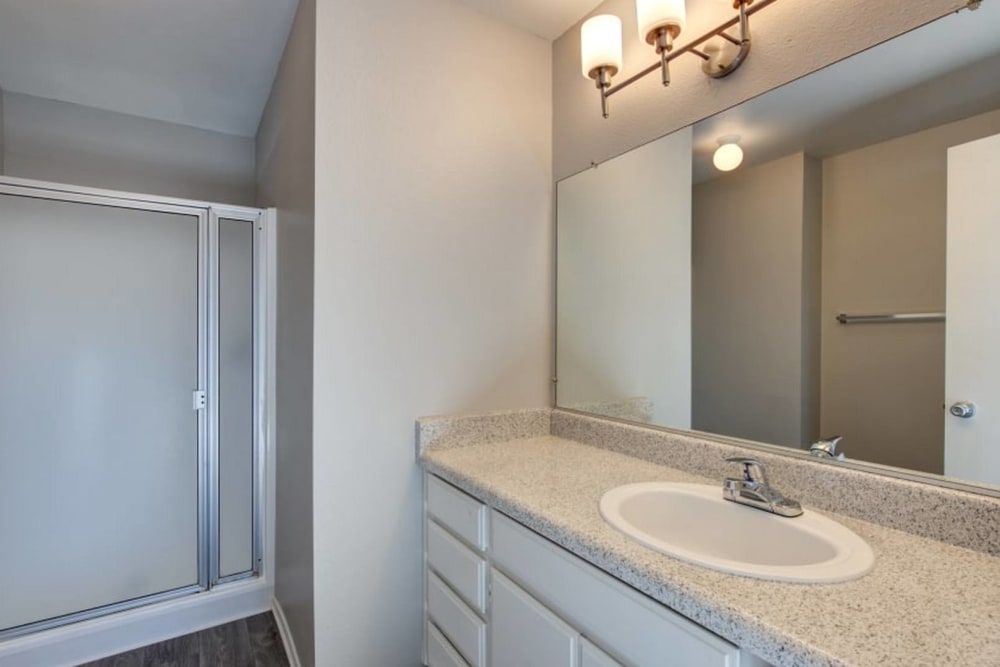 Apartment bathroom at Cordova Park Apartments in Lancaster, California
