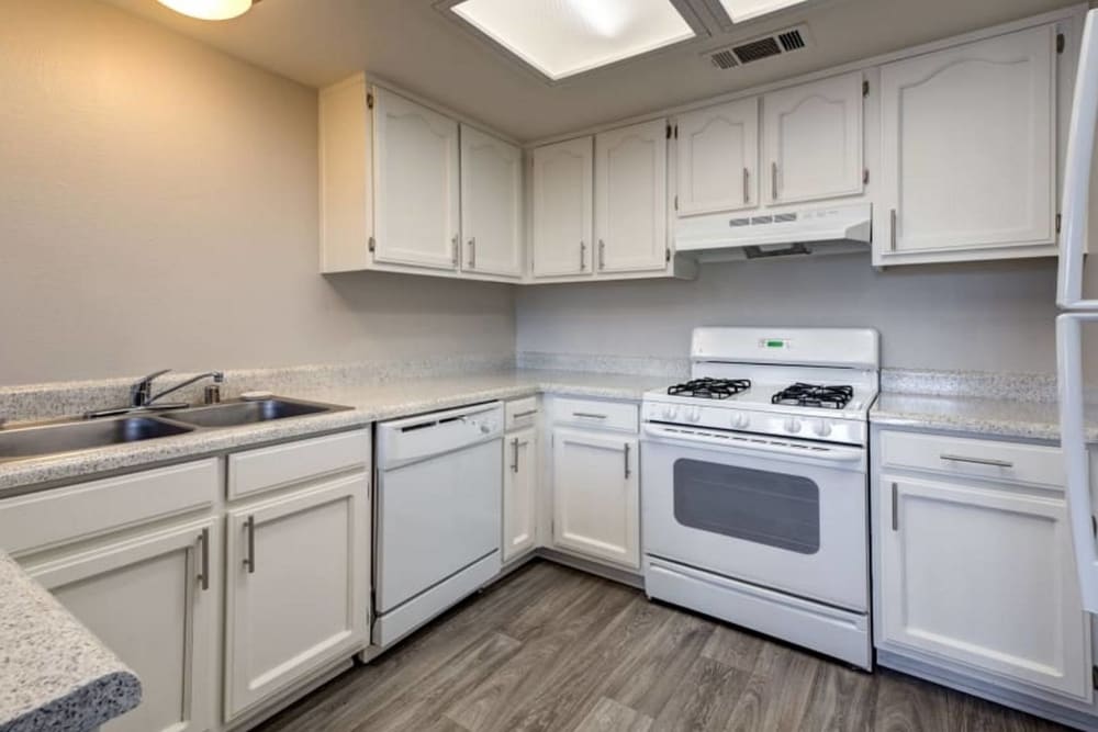 Apartment kitchen at Cordova Park Apartments in Lancaster, California