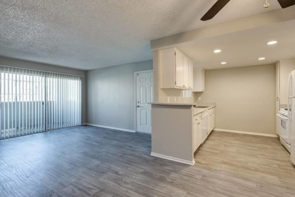 Large living room space at Cordova Park Apartments in Lancaster, California
