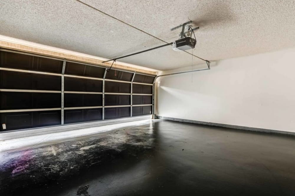 Attached car garage at Sienna Heights Apartments in Lancaster, California