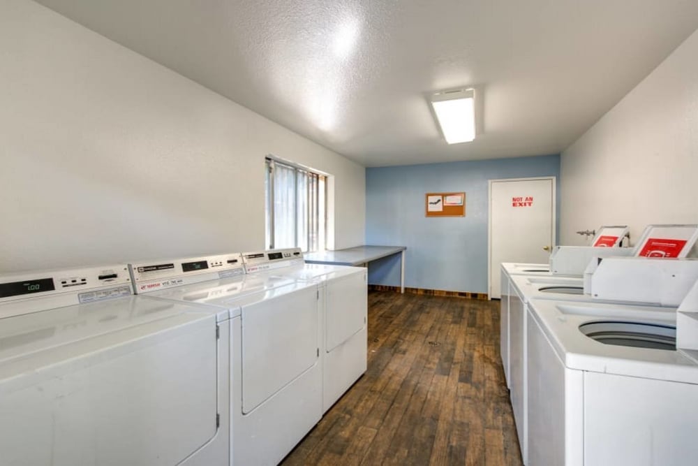 Community laundry room at Sienna Heights Apartments in Lancaster, California