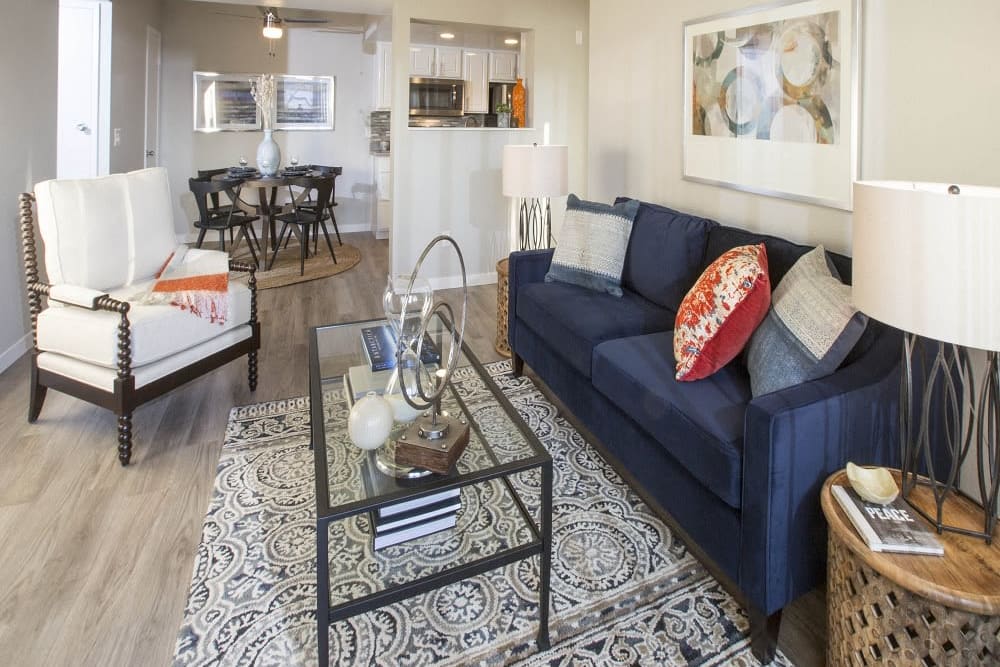 Living room and dining area at Cassia Apartments in Santa Maria, California