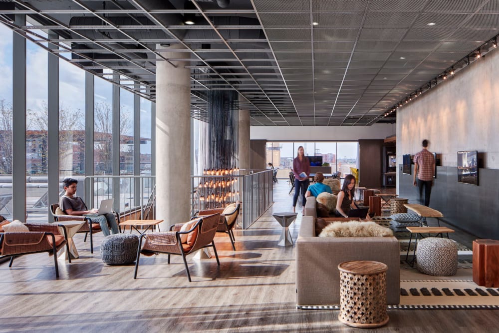 Resident lounge area with tons of cozy seating at The Parker Fulton Market in Chicago, Illinois
