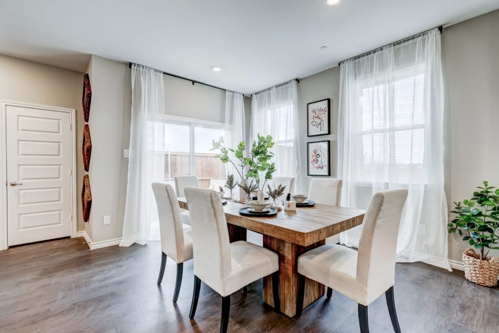 Nice dining area with wood-style flooring at Antigua at Lakewood Ranch in Lakewood Ranch, Florida