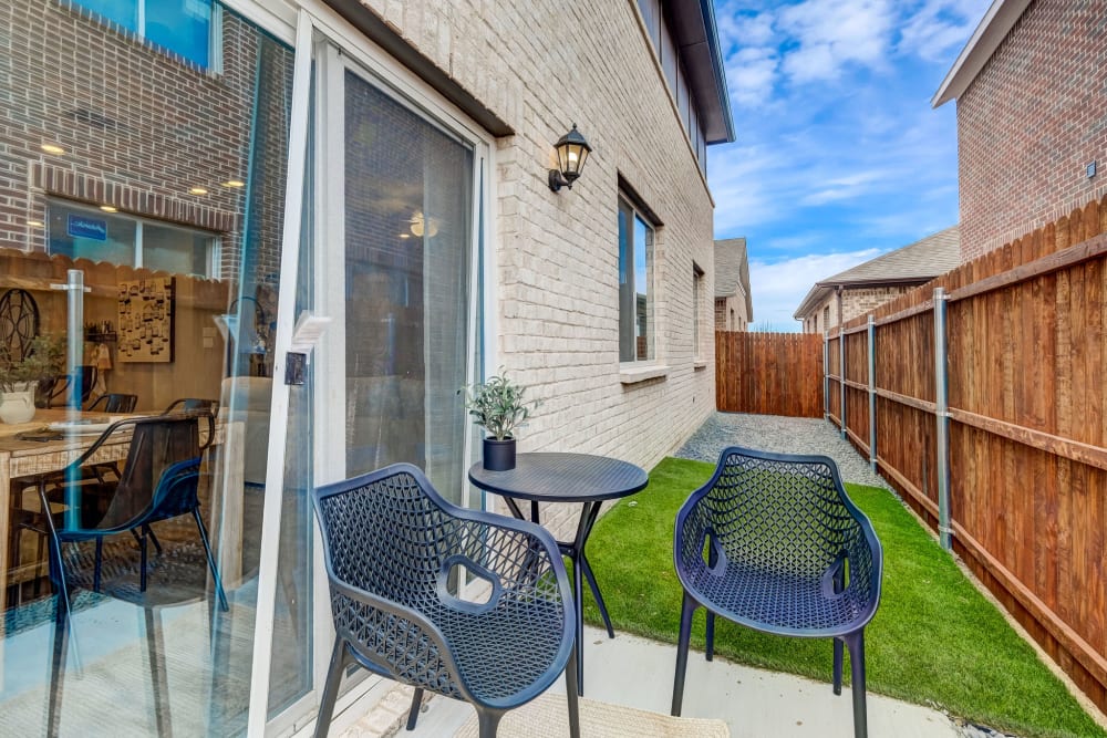 Outdoor patio and grass area at Antigua at Lakewood Ranch in Lakewood Ranch, Florida