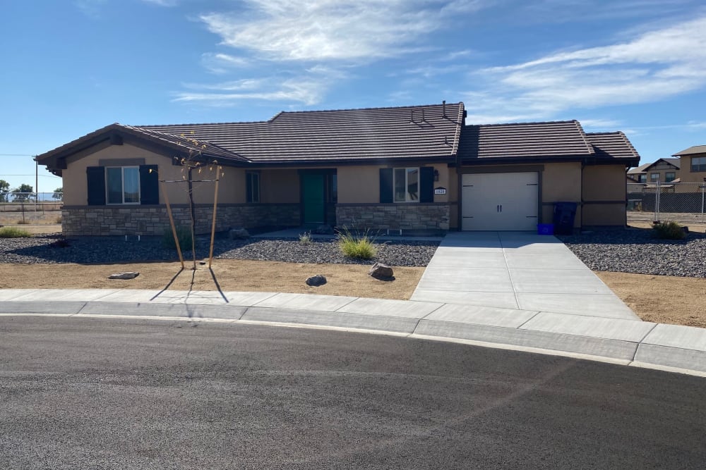 exterior of home with garage and driveway at Mountain View in Fallon, Nevada