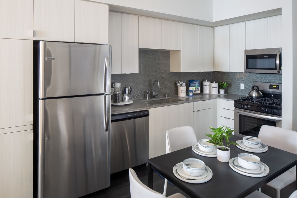 kitchen with stainless steel appliances at Jefferson SoLA in South Gate, California