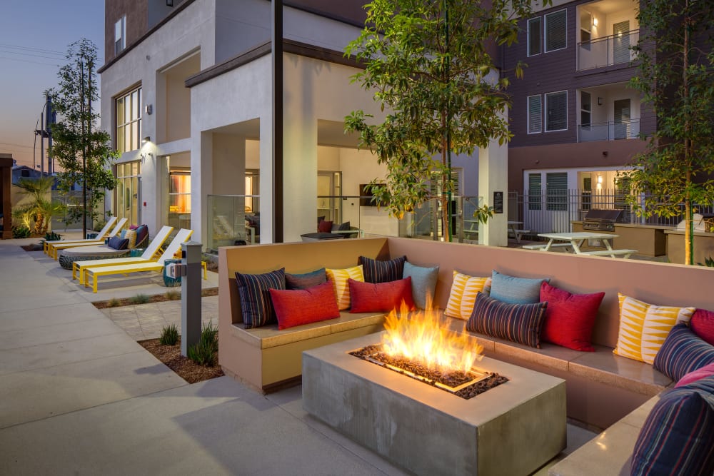 outdoor seating around a fireplace at Jefferson SoLA in South Gate, California