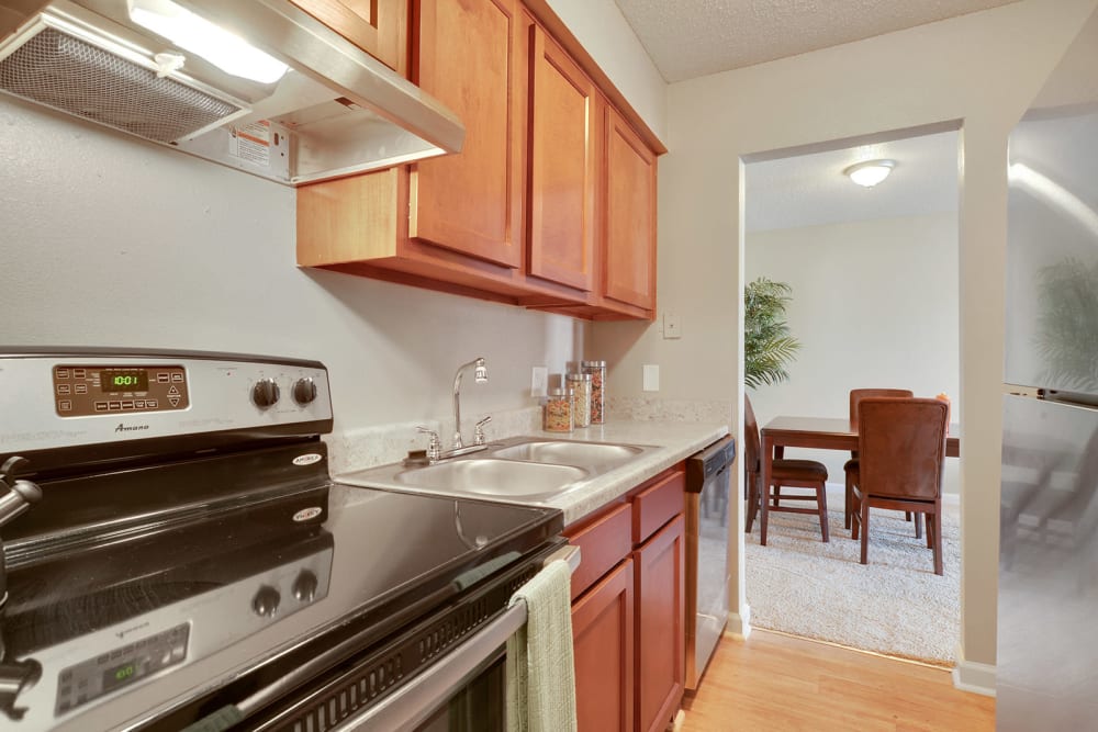 Kitchen with modern appliances at Avalon Apartment Homes in Baton Rouge, Louisiana