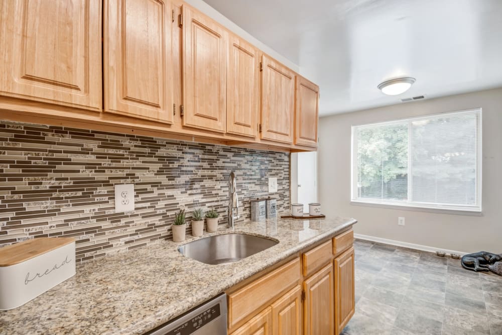 Kitchen in a home at Montgomery Trace Apartment Homes in Silver Spring, Maryland