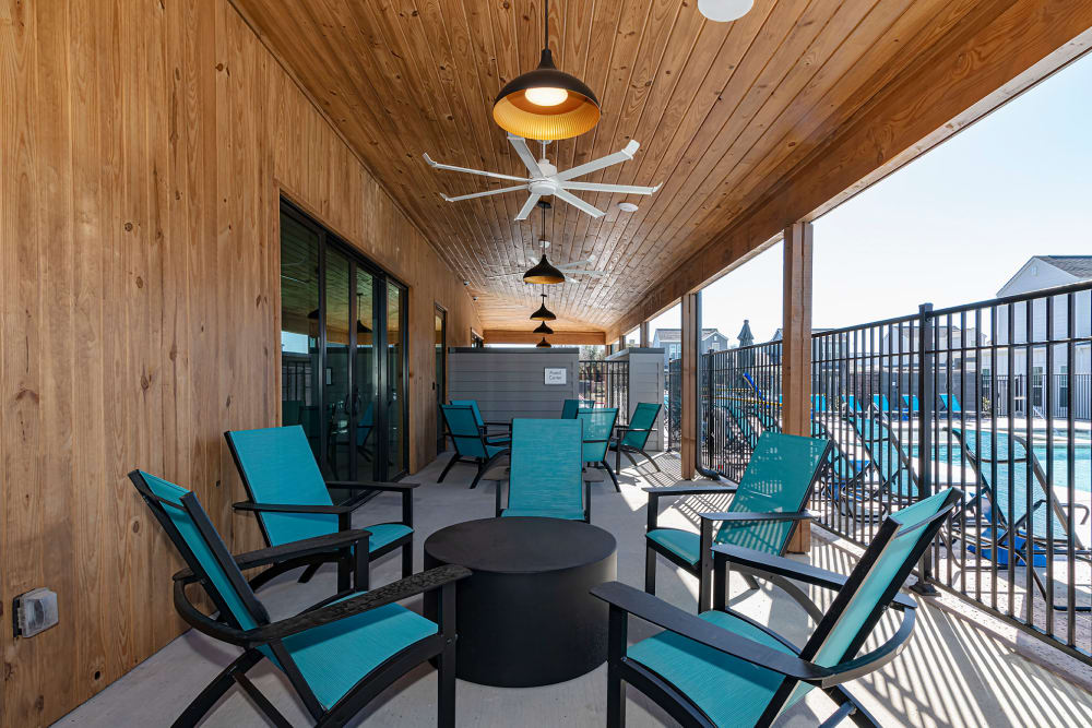 Veranda lounge area with ceiling fans at Elevate at Skyline in McKinney, Texas