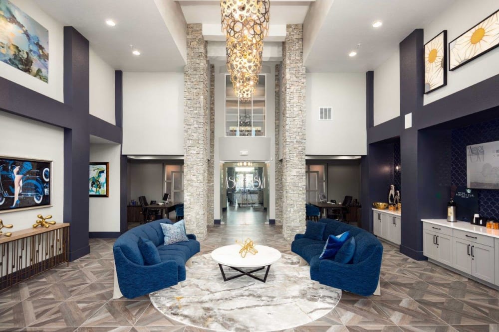 Resident clubhouse with very high ceilings at The Addison Skyway Marina in St. Petersburg, Florida