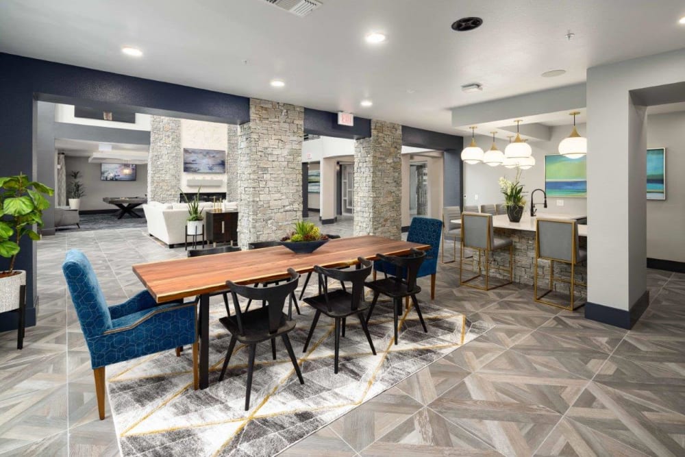 Large table and chairs in the clubhouse at The Addison Skyway Marina in St. Petersburg, Florida