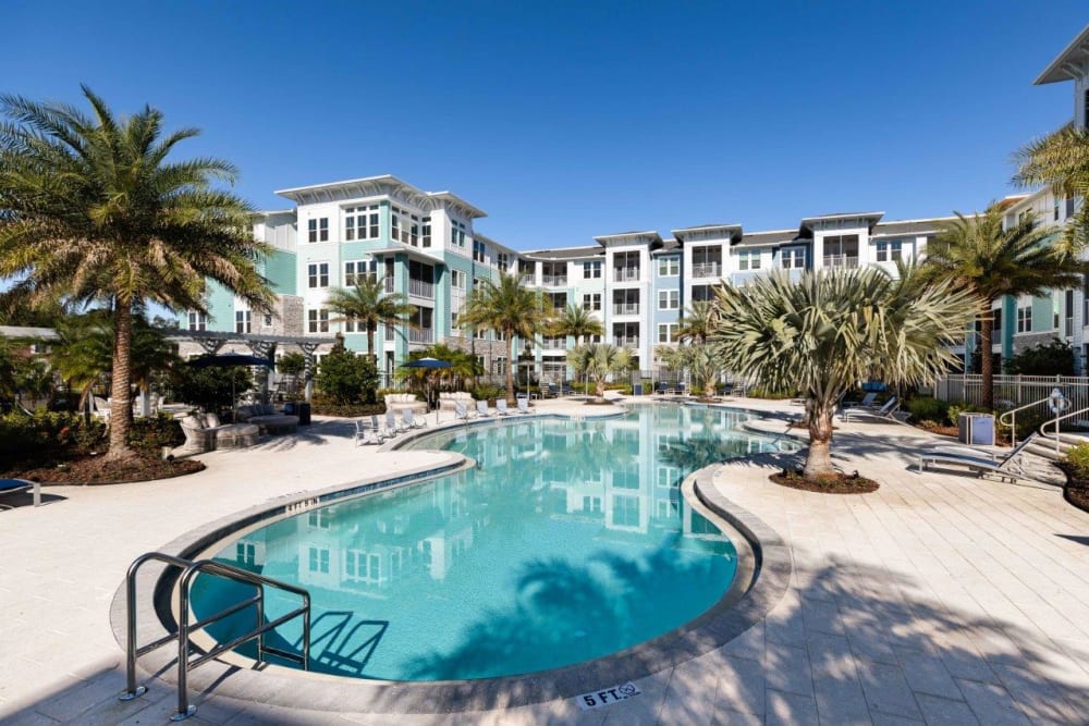 Resort-style swimming pool at The Addison Skyway Marina in St. Petersburg, Florida