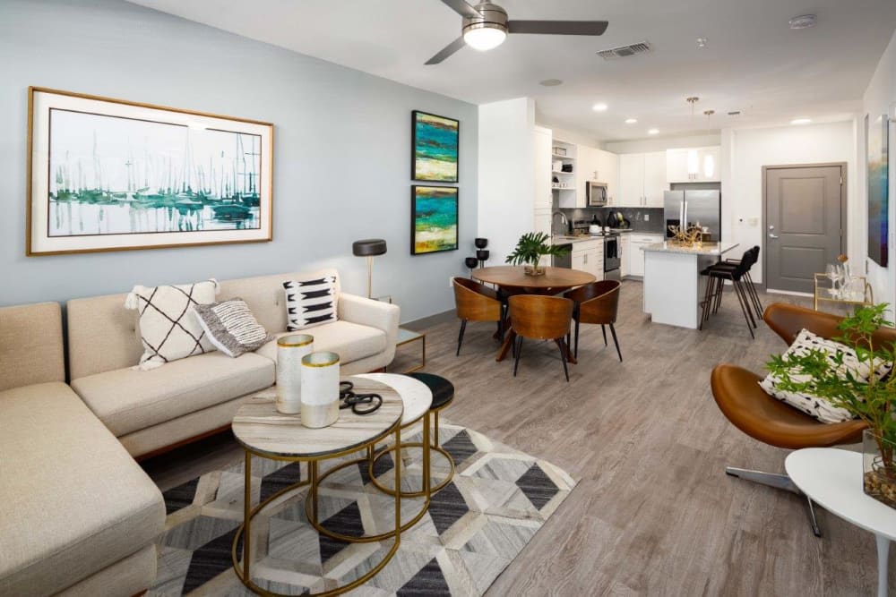 Large open living area with a ceiling fan to stay cool at The Addison Skyway Marina in St. Petersburg, Florida