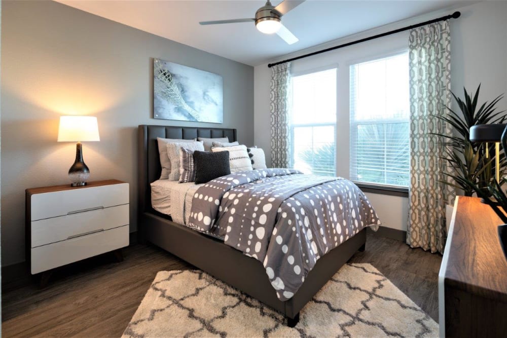Well lit bedroom in a model home at The Addison Skyway Marina in St. Petersburg, Florida