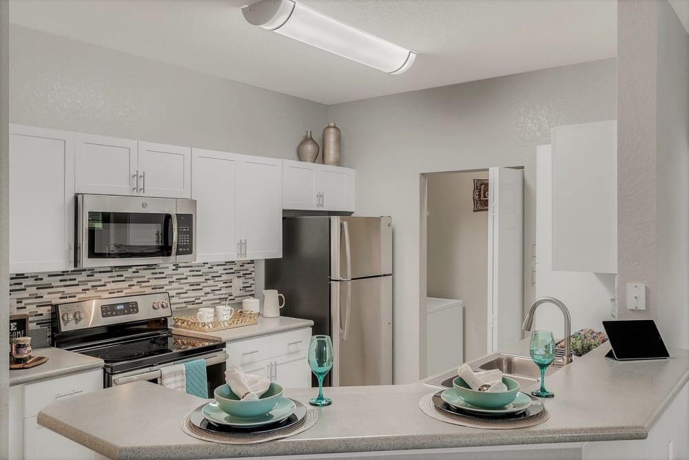 Modern apartment kitchen at Citrus Tower in Clermont, Florida