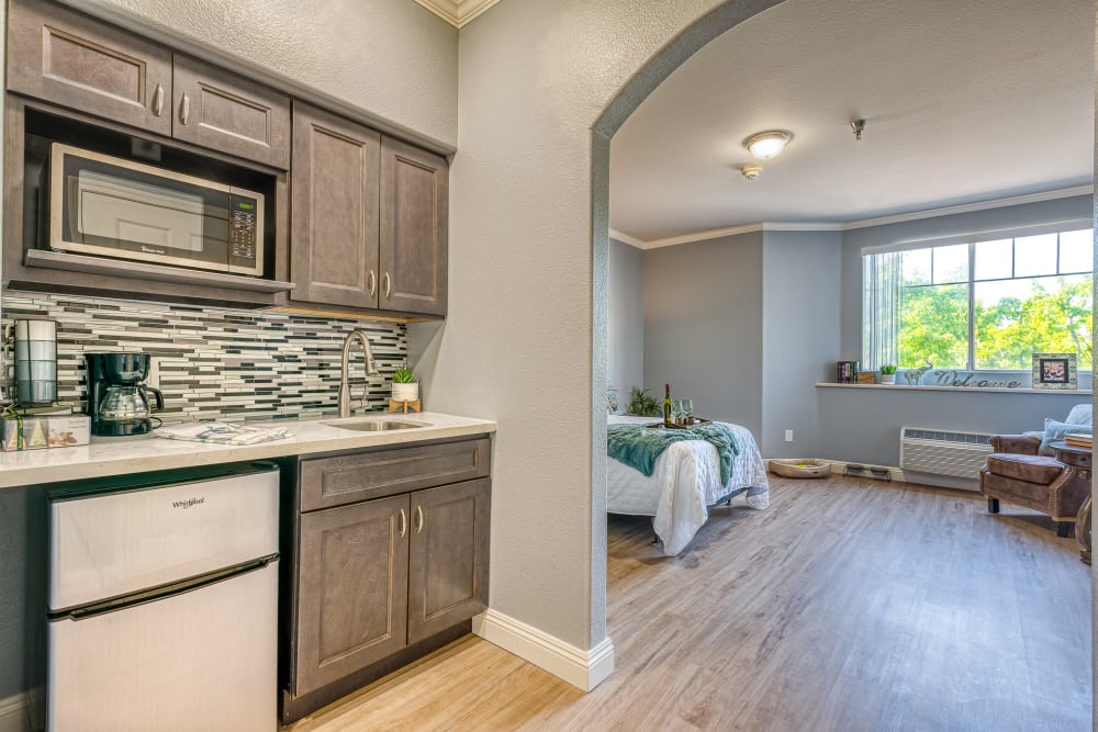 Kitchen leading to a bedroom at Pacifica Senior Living Chino Hills in Chino Hills, California