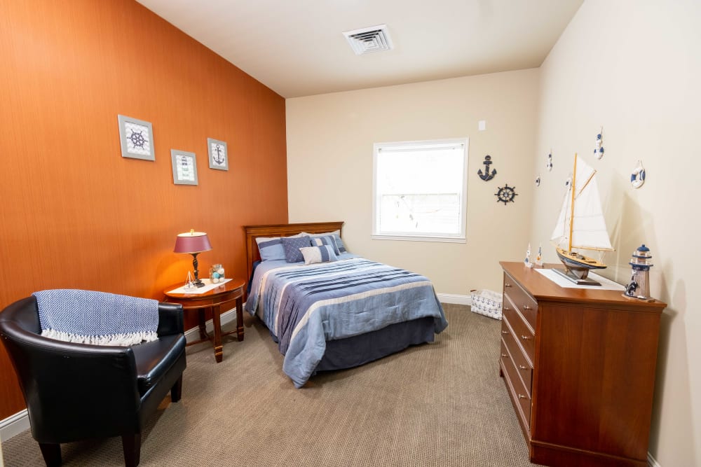 Comfortable bedroom at The Heritage Memory Care in The Woodlands, Texas