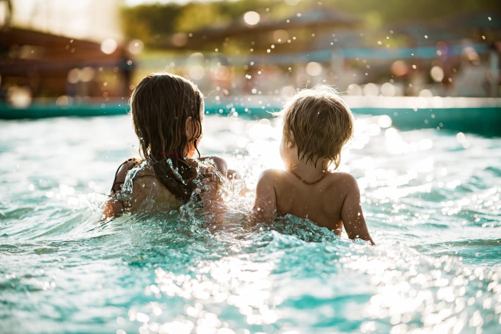 Kids playing in the refreshing swimming pool at Mayfair Reserve in Wauwatosa, Wisconsin