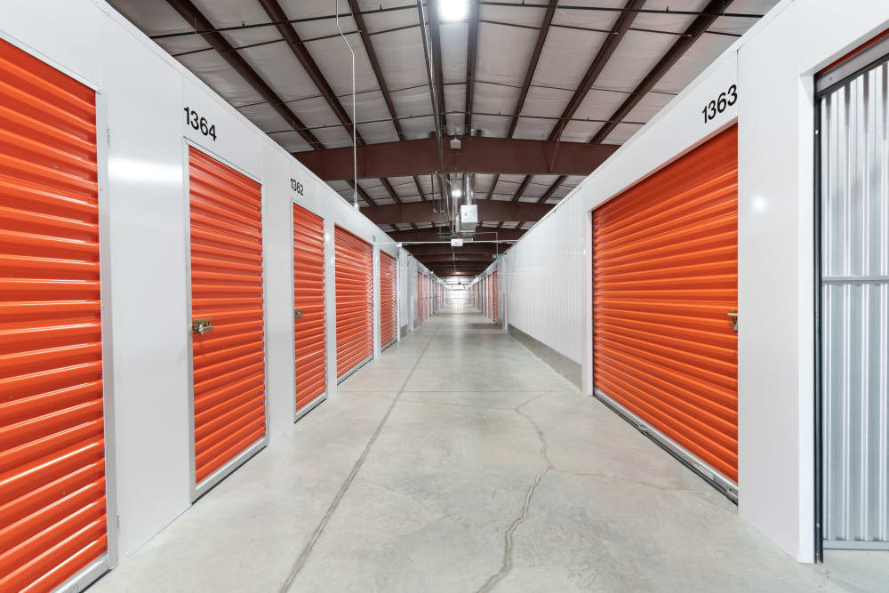 Indoor units with bright doors at BuxBear Storage Colorado Springs in Colorado Springs, Colorado