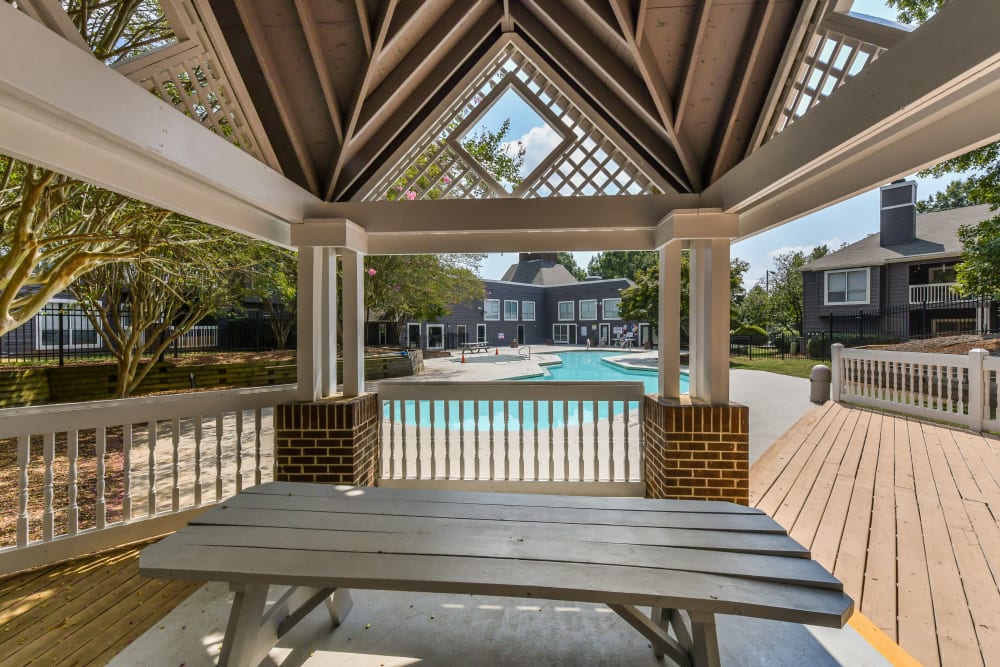 Inside the gazebo looking at the swimming pool at The Oasis at Regal Oaks in Charlotte, North Carolina