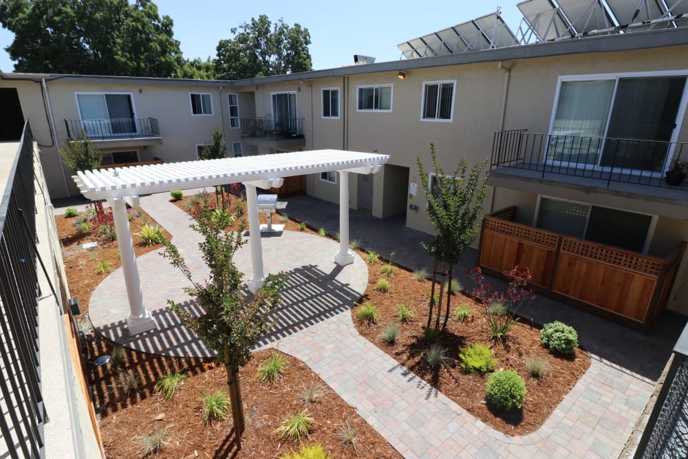 Serene courtyard at Marina Haven Apartment Homes in San Leandro, California