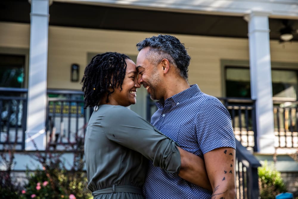 A couple embracing outside their home near modSTORAGE in Aspen, Colorado