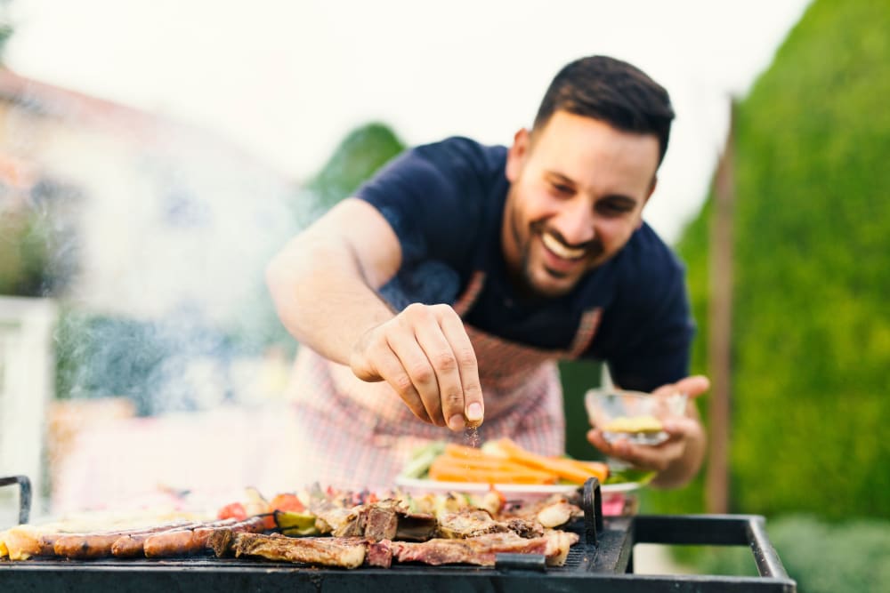 A resident grilling at Palmilla in Pensacola, Florida