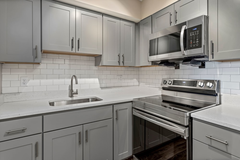 kitchen with stainless steel appliances at Bauer Park in Rockville, Maryland