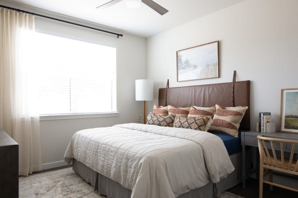 Bedroom with large window at Bellrock Memorial in Houston, Texas