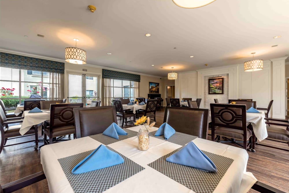 Spacious dining room at Pacifica Senior Living Mission Villa in Daly City, California