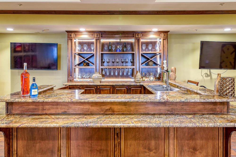 Multi purpose room with TV at Pacifica Senior Living Oakland Heights in Oakland, California
