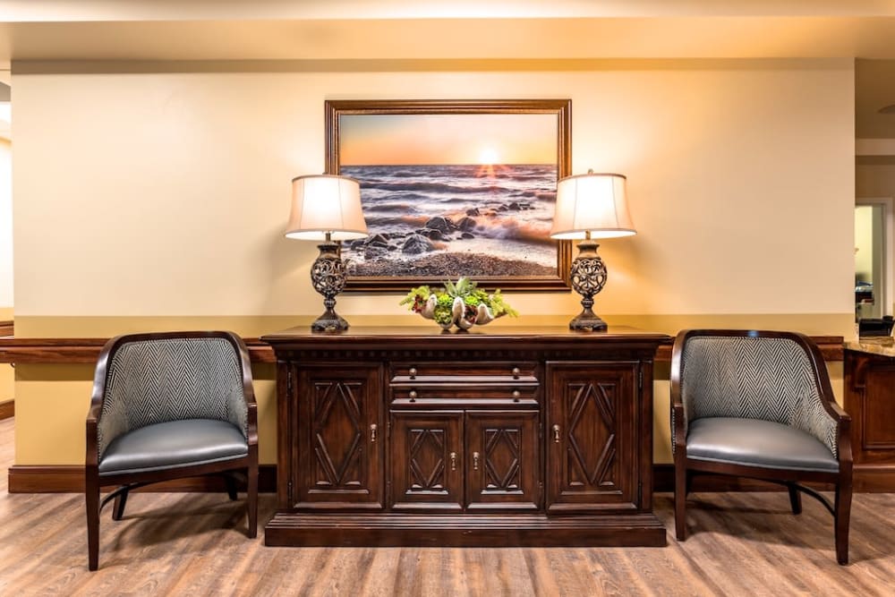 Hallway with seating at Pacifica Senior Living Oxnard in Oxnard, California