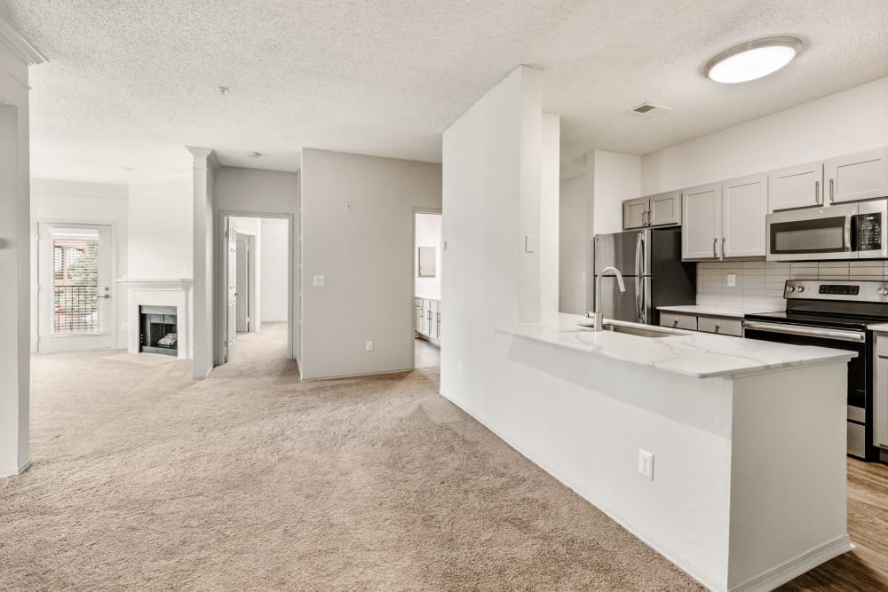 Open floor plan with kitchen at Greenwood Plaza in Centennial, Colorado