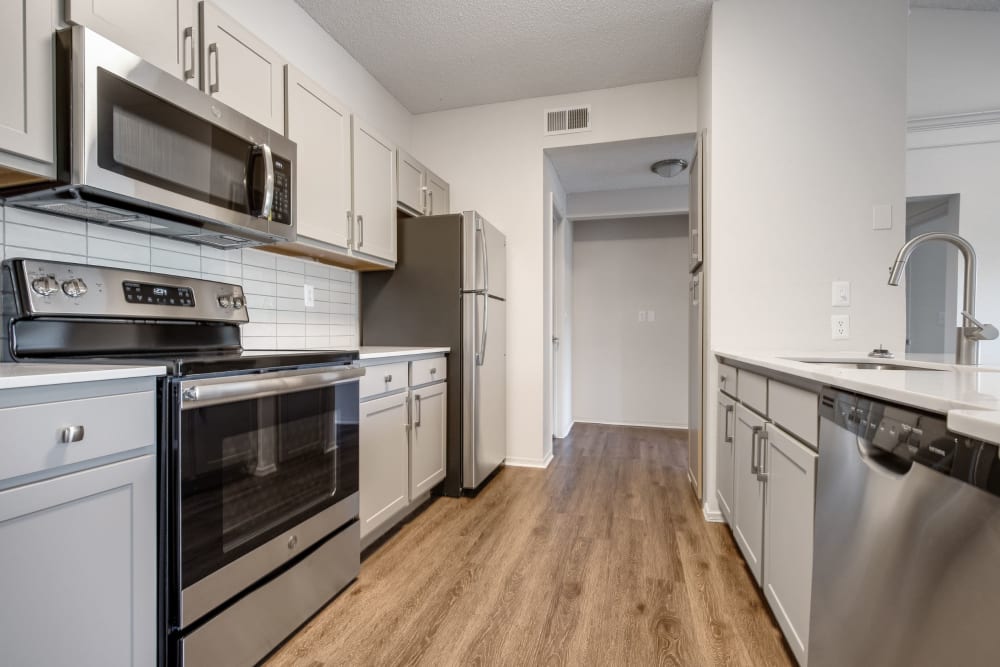 Wood-Style flooring in Kitchen at Greenwood Plaza in Centennial, Colorado