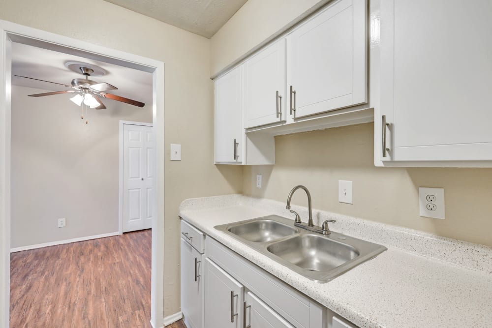 Kitchen sink and cabinets at Vista Park in Dallas, Texas