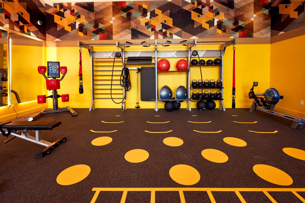 Spacious fitness center with ample equipment at The Linden in Long Beach, California