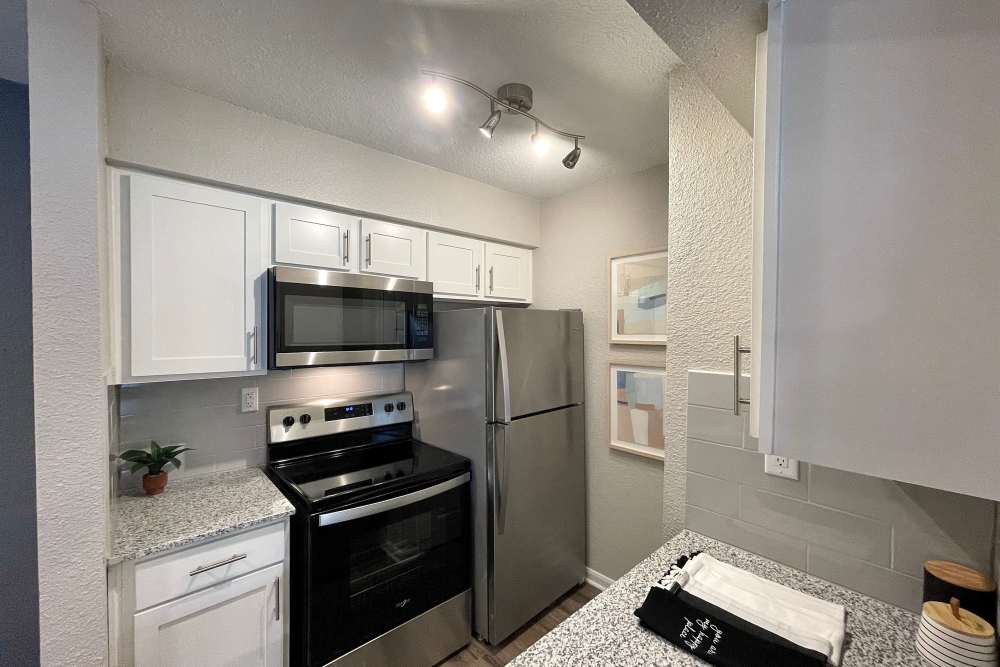 Modern kitchens and appliances at The Abbey at Energy Corridor in Houston, Texas