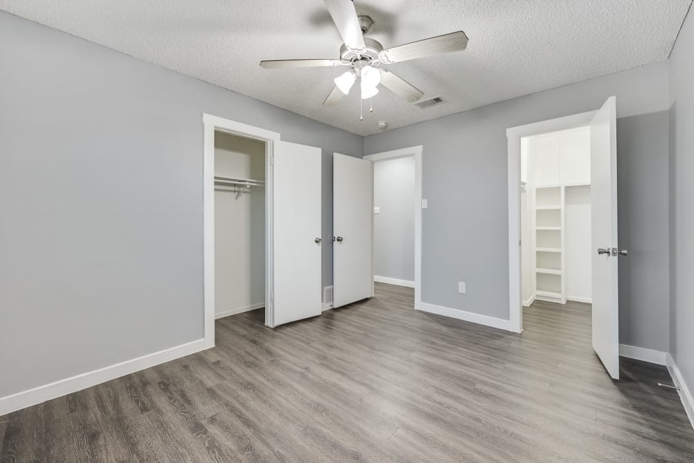 bedroom with large walk in closet at Buffalo Ranch in Farmersville, Texas