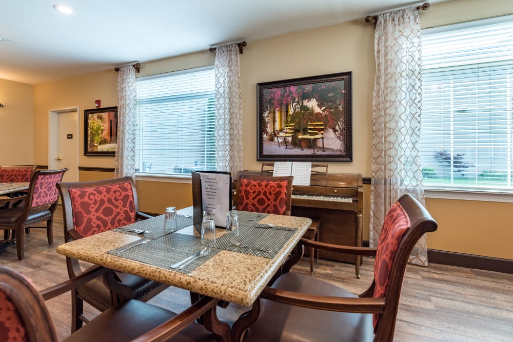 Table and seating in the dining area at Pacifica Senior Living Ellensburg in Ellensburg, Washington