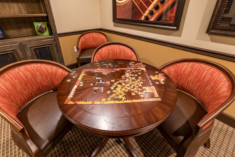 Community table with a puzzle at Pacifica Senior Living Ellensburg in Ellensburg, Washington